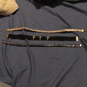 3 chocker necklaces.